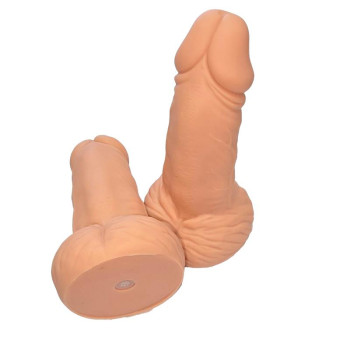 Penis-shaped whistle with testicles